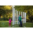 A school age boy & Gitl with a preschool girl playing the Colossus Chimes 
